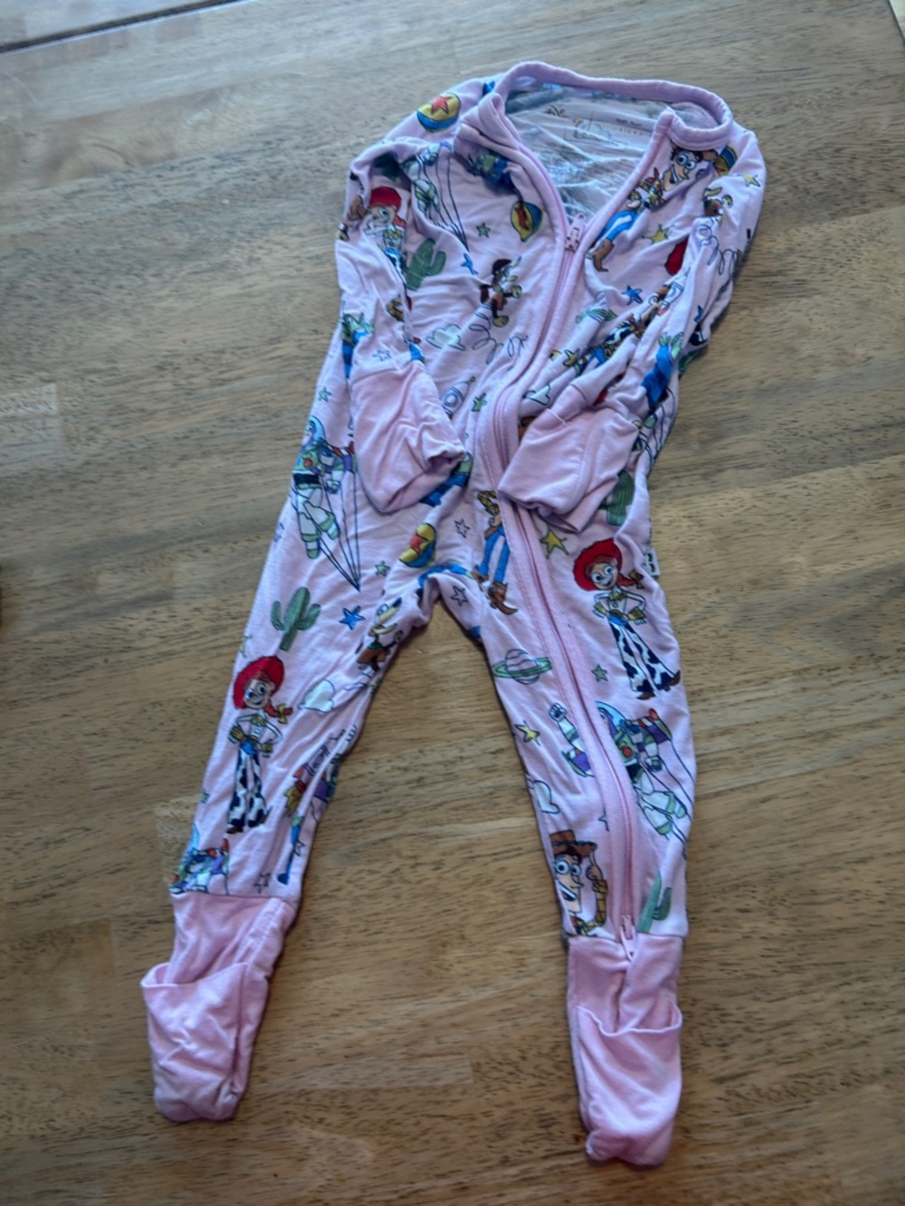 Little Sleepies Pink Footed One-Piece Romper with Disney Toy Story print
